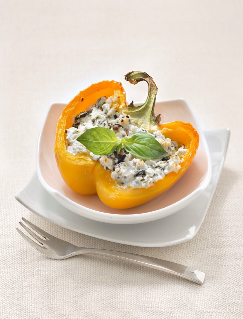 Yellow pepper stuffed with sheep's milk cheese and basil