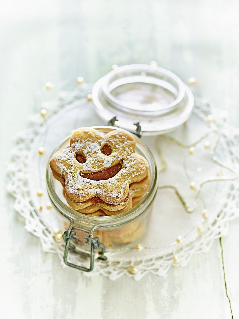 Children's smiley biscuits in a jar