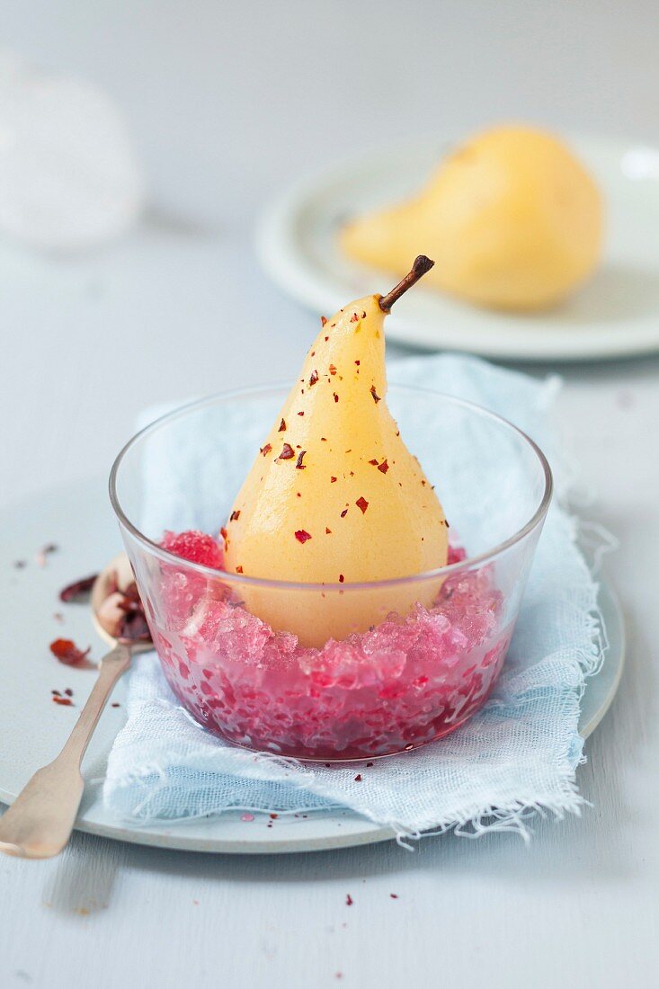 Poached pears with pink pepper and pomegranate granita