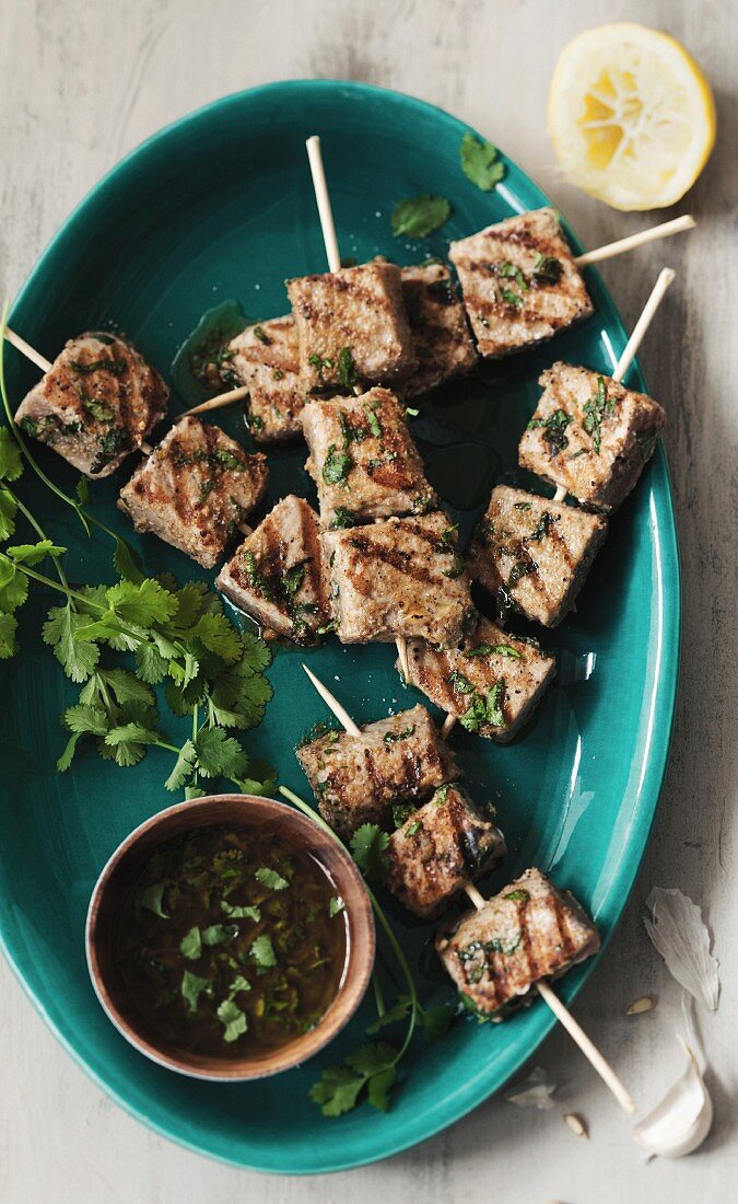 Lemon marinated tuna brochettes with parsley, coriander, garlic, ginger and spices