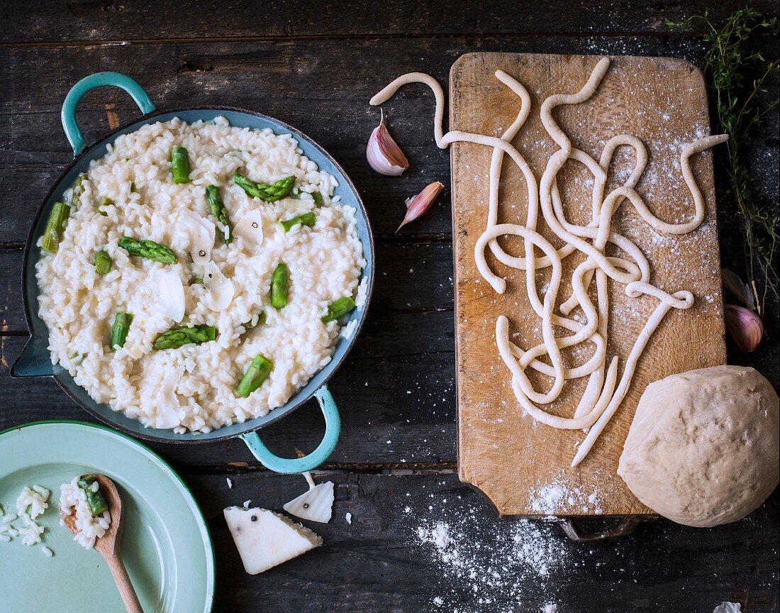 Homemade thick spaghetti and asparagus-pecorino risotto