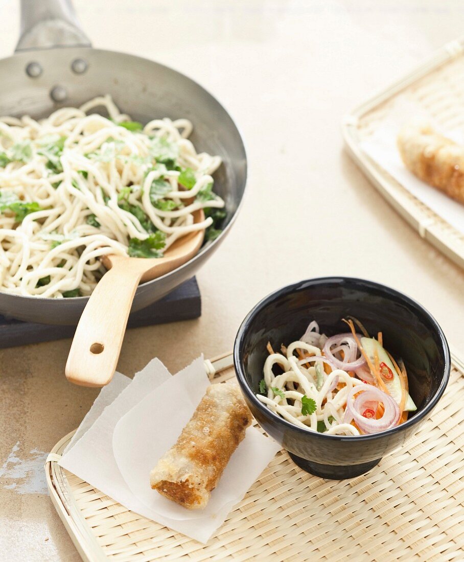 Sauté noodle, coriander, red onion and grated carrot bo-bun with nems