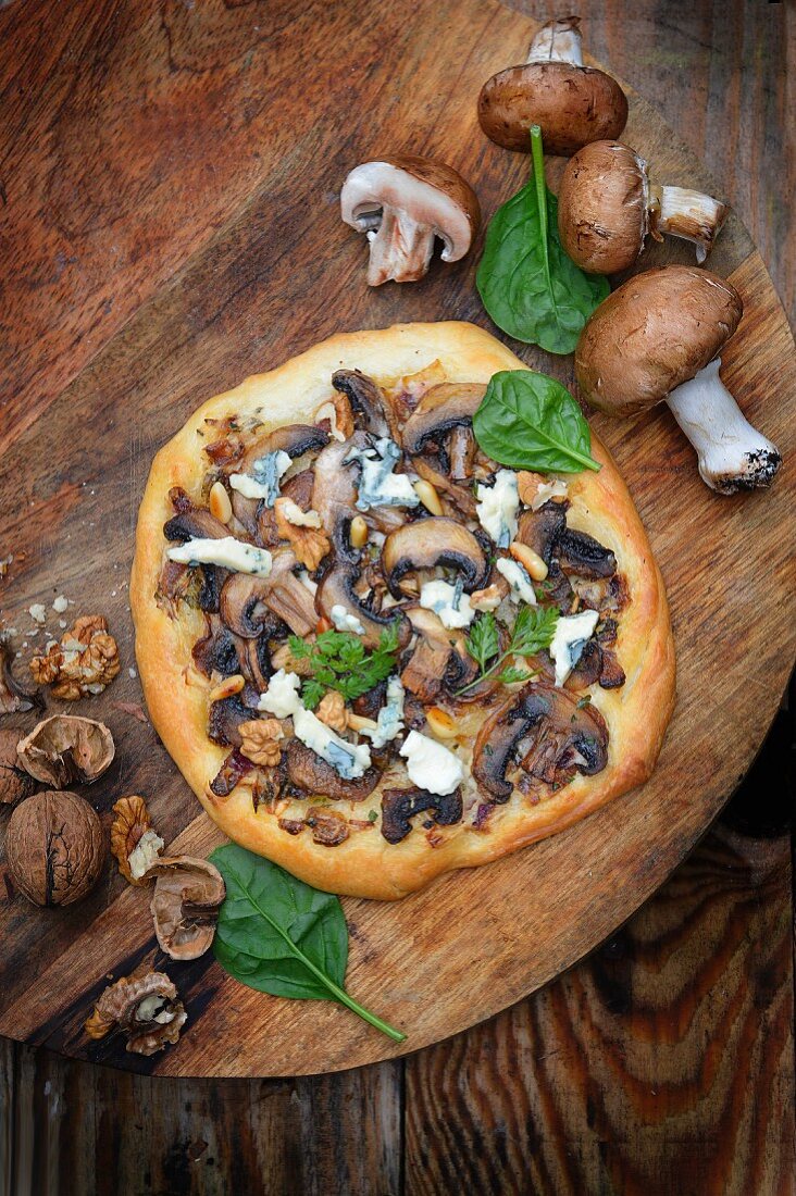 Mushroom, blue cheese and walnut pizzas
