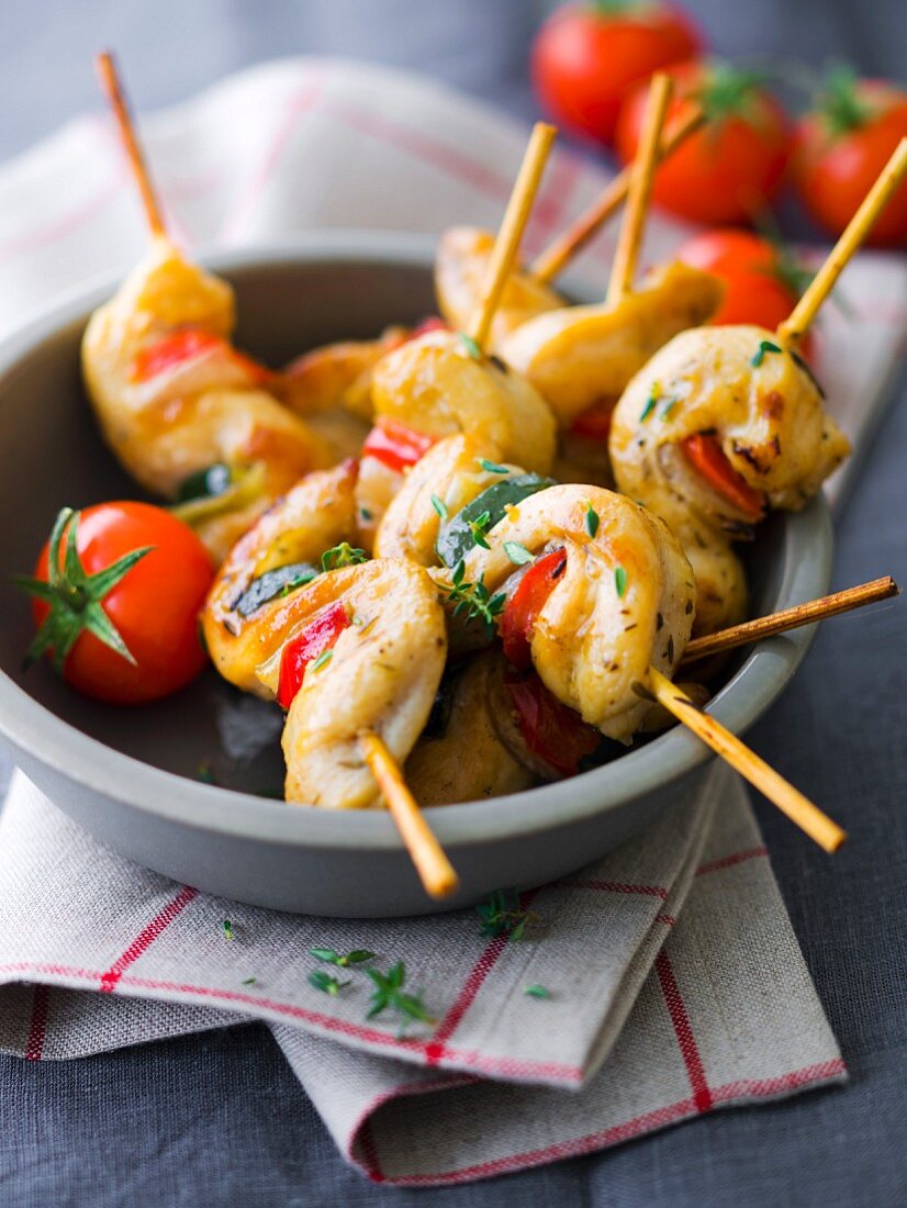 Mini chicken brochettes marinated in honey and thyme