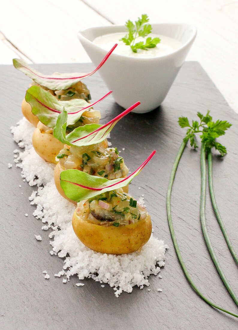 Grenaille potatoes stuffed with oyster and bass tartare