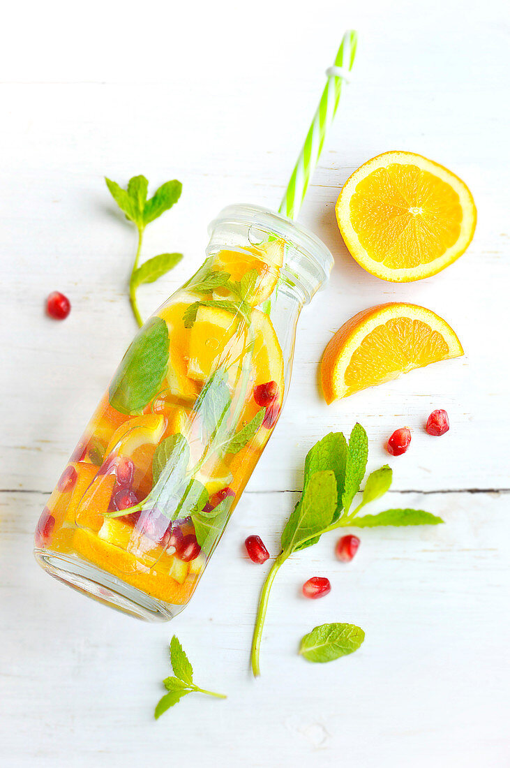 Orange, pomegranate and mint detox water