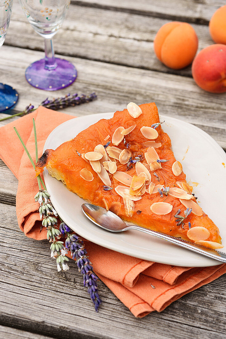 Slice of apricot, thinly sliced almond and lavender