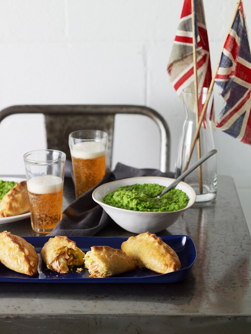 Salmon, potato and egg turnovers with creamed peas