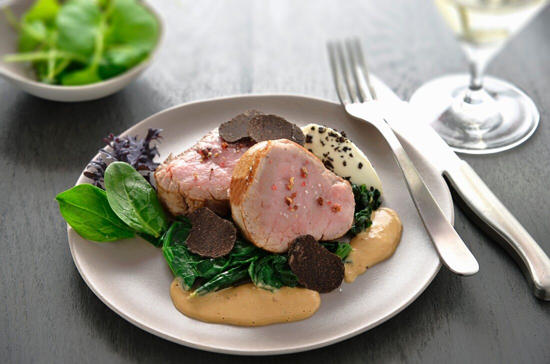 Veal filet mignon, spinach, thinly sliced truffles, parsnip mash quenelles, Madeira sauce