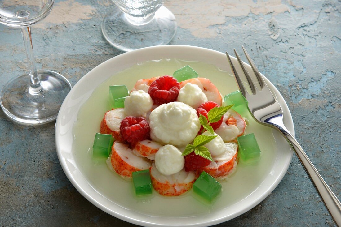 Salad with lobster meat, raspberries, black radish mousseline and lemon balm jelly