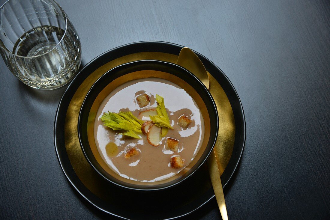 Cream of chestnut and celery soup with ceps