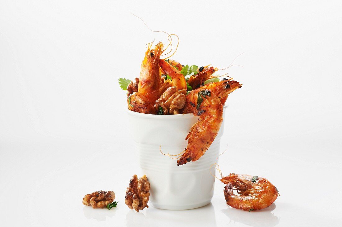 Shrimps and walnuts marinated with herbs and spices
