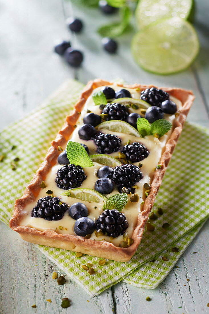 Lemon, blackberry, mint and crushed pistachio rectangular tart