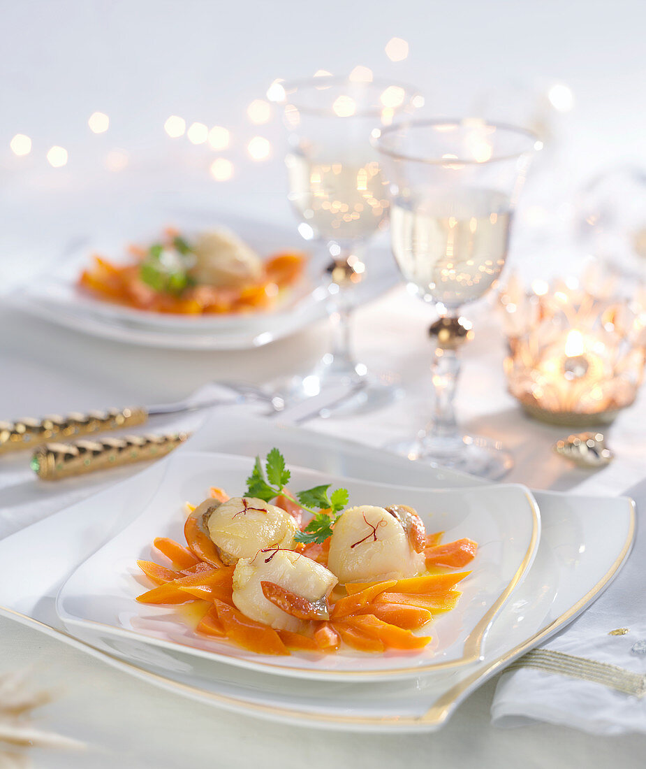 Scallops and stewed carrots with orange