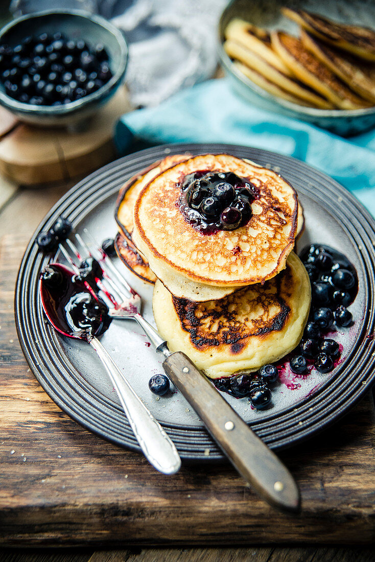Ricotta pancakes with blueberry sauce