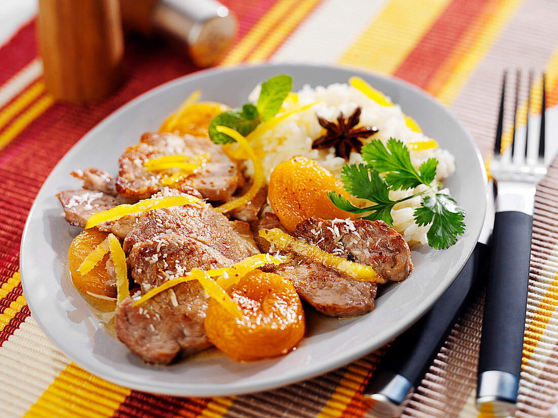 Sweet and salty thinly sliced pork with apricots and coconut milk