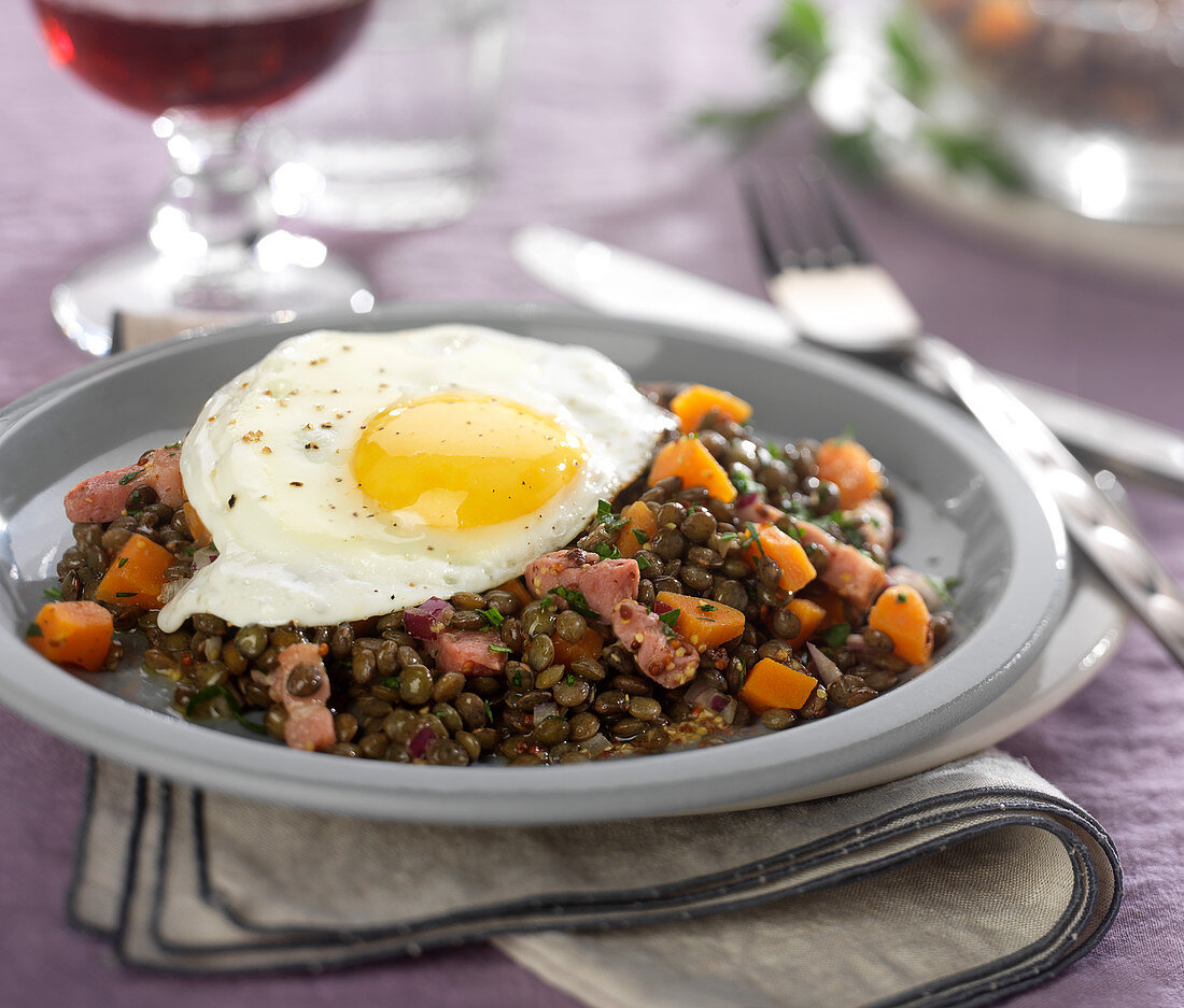 Warm lentil and mustard salad with a fried egg