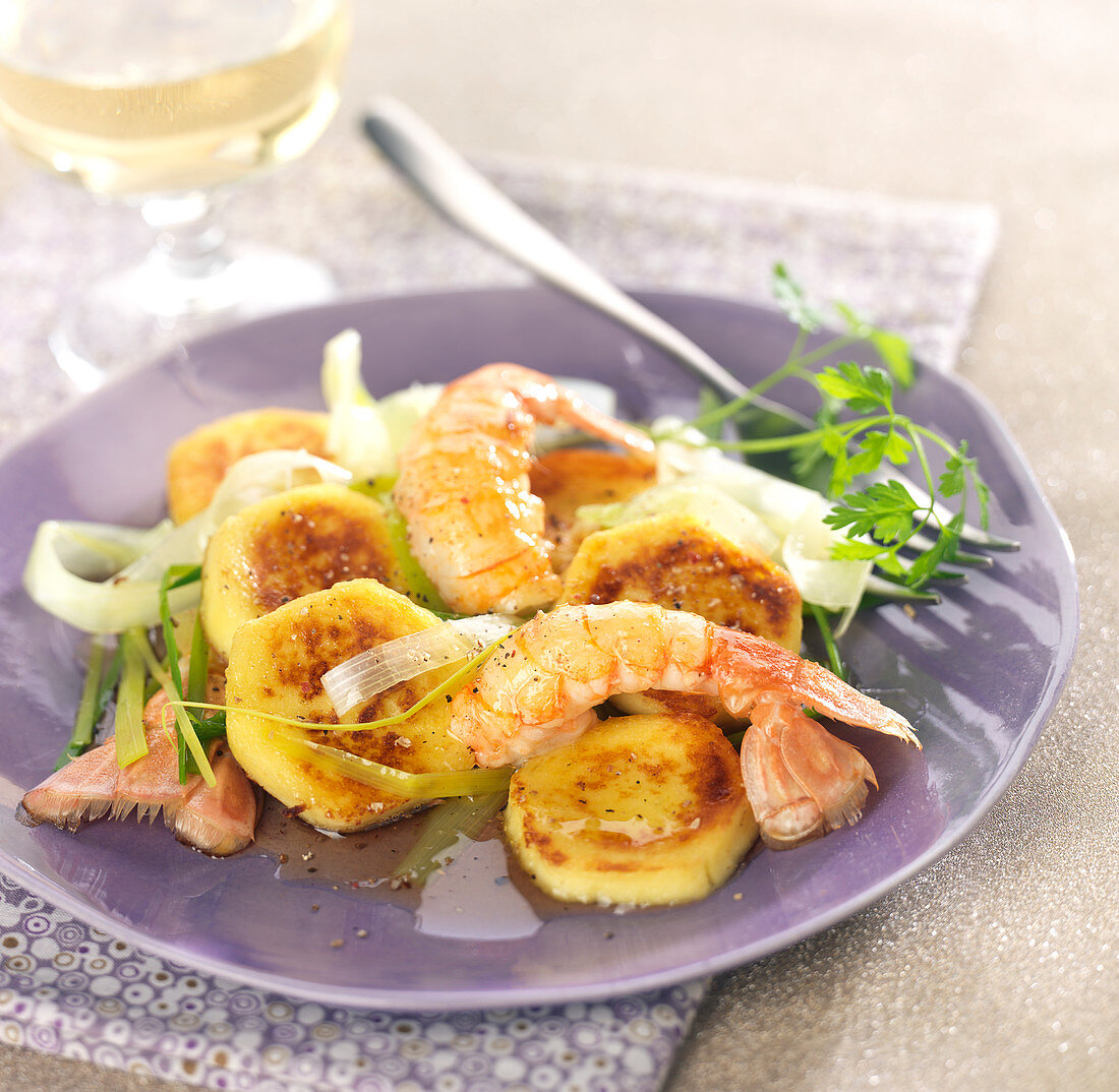 Pan-fried quenelles and langoustines cooked with cider