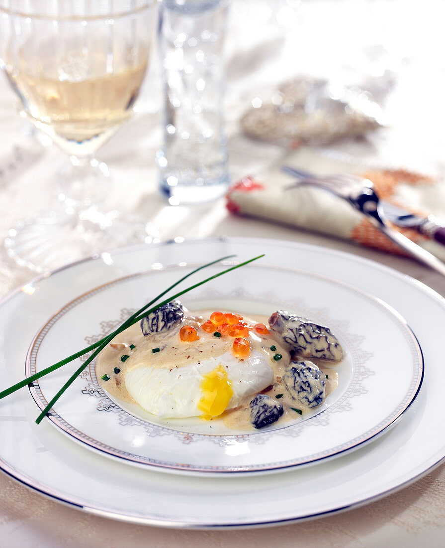 Poached egg with morels and salmon roe