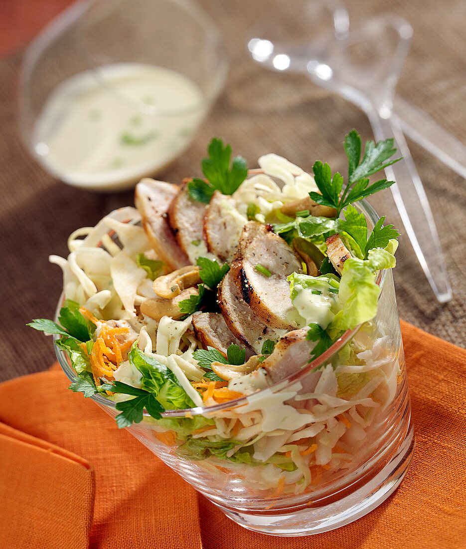 Cabbage, grated carrot, thinly sliced turkey and cashew salad
