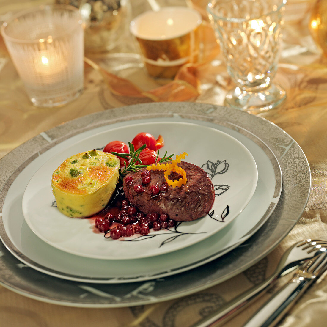 Doe fillet with cranberries, romanesco cabbage flan
