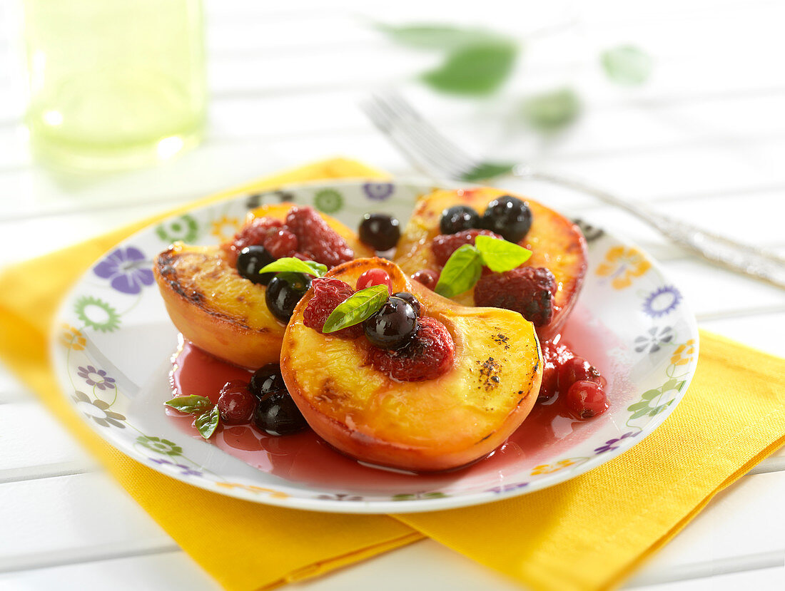 Roasted peaches with summer fruit