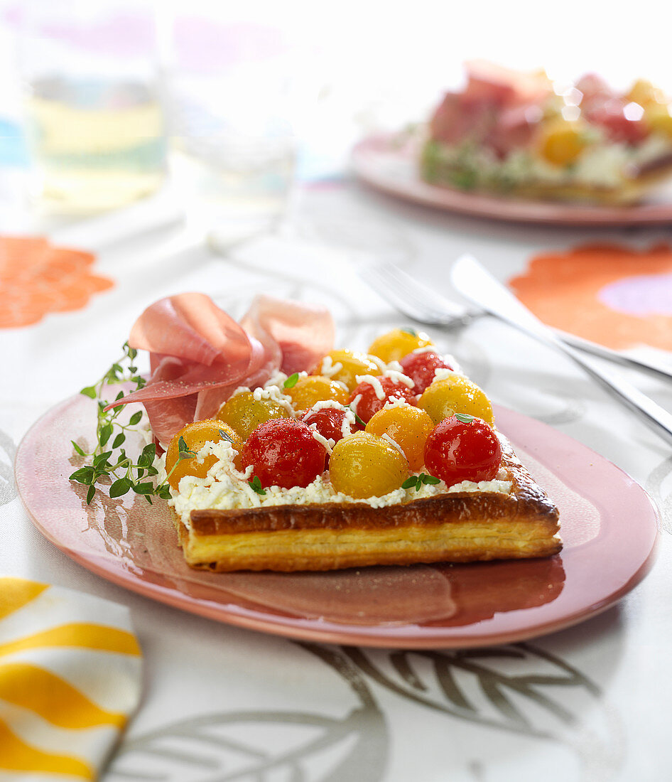 Cherry tomato, petit Billy cheese and raw ham flaky pastry tart