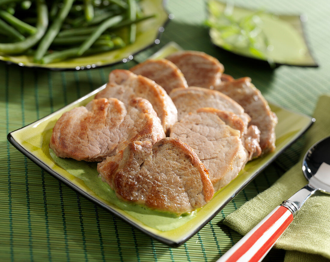 Pork Filet mignon medaillons with herbs and plain green beans