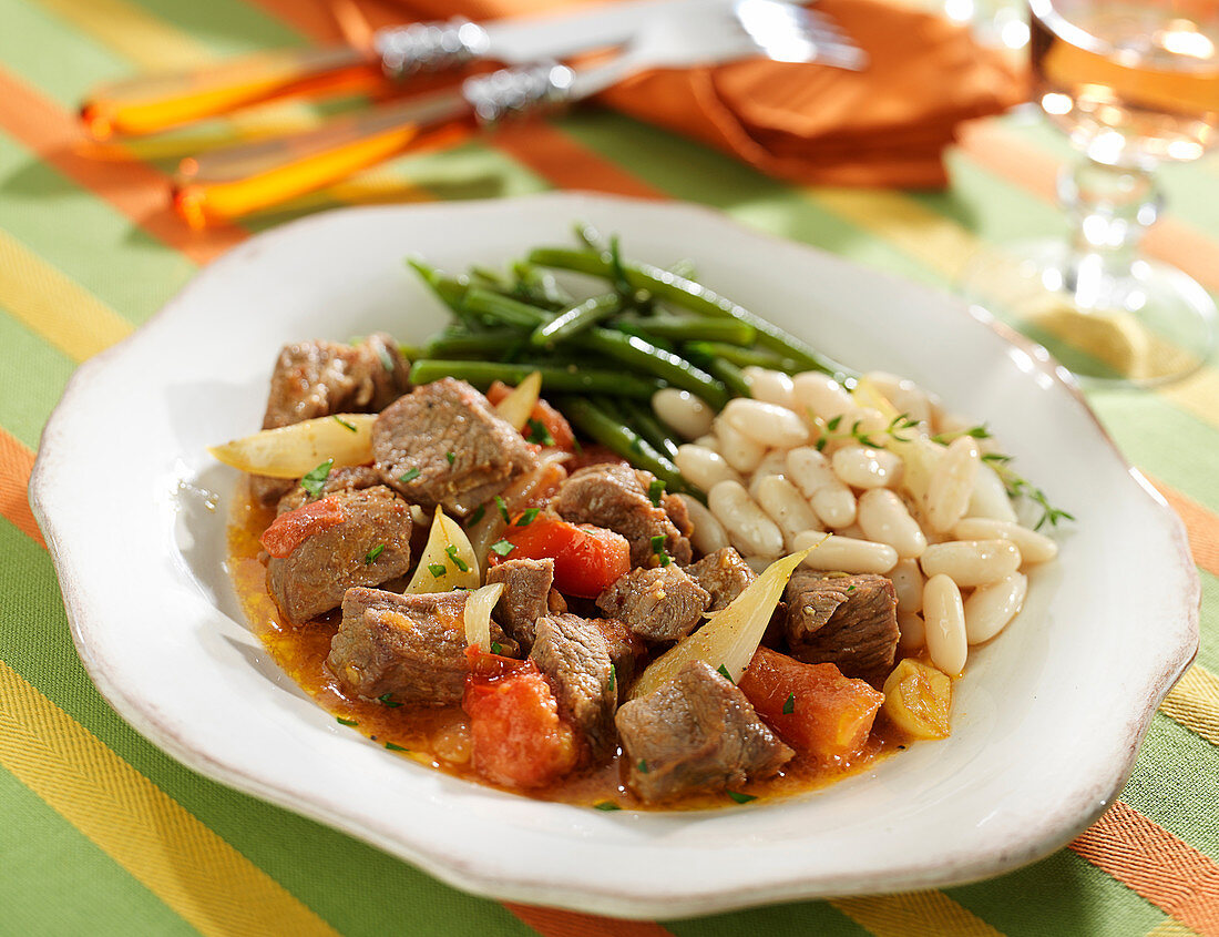 Navarin of lamb with white haricot baans and green beans
