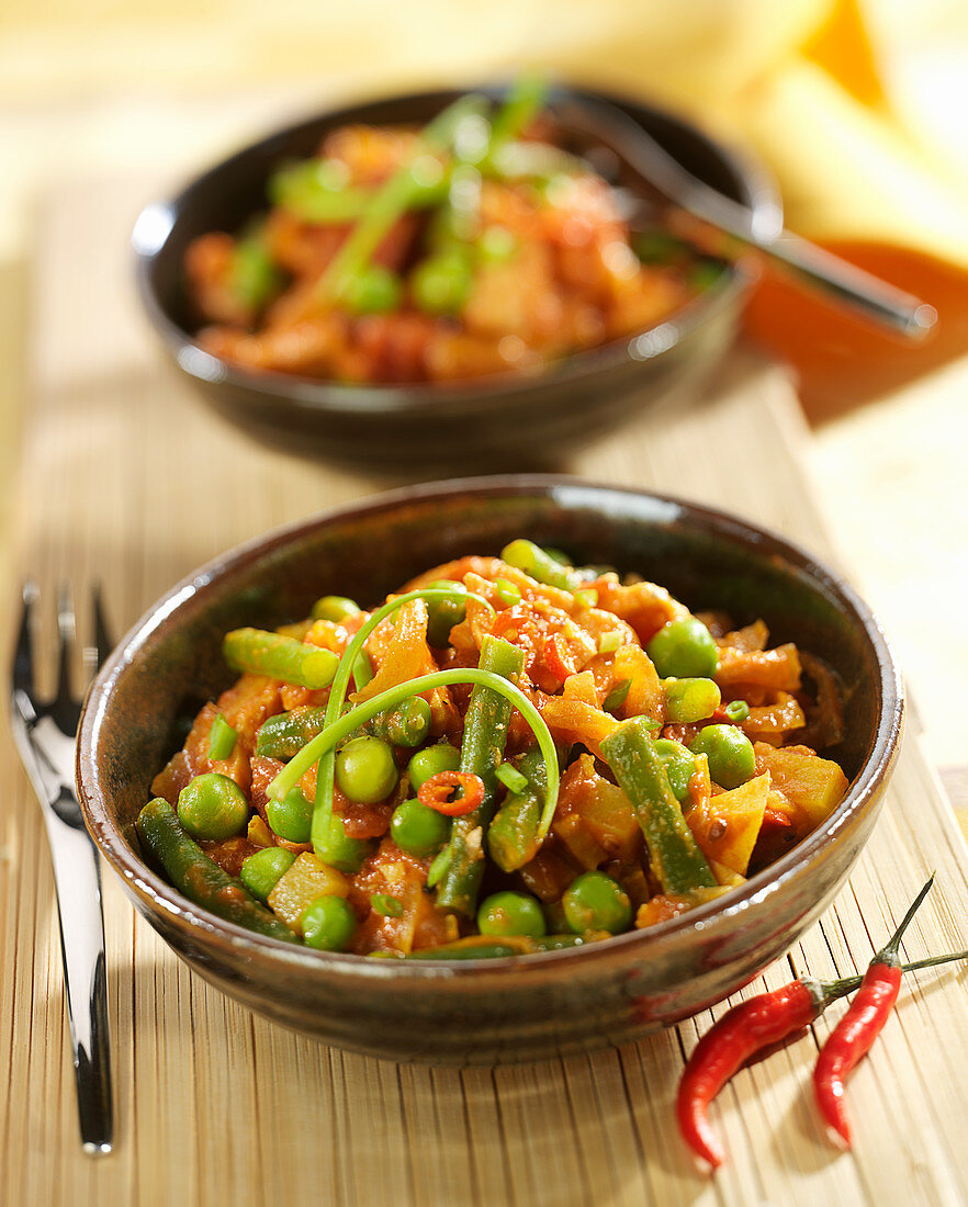 Mixed vegetables and thinly sliced spicy shoulder of pork