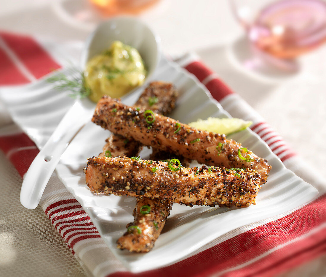 Salmon sticks coated in pepper, dill mayonnaise