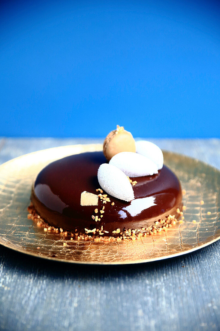 Chocolate Mousse,Raspberry,Pistachio Biscuit And Palet Feuillantine Entremets Glazed With Chocolate