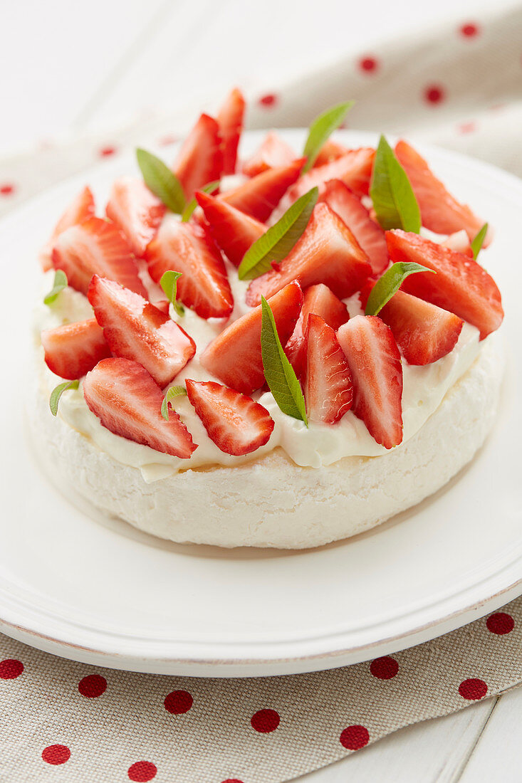 White chocolate and strawberry meringue cake