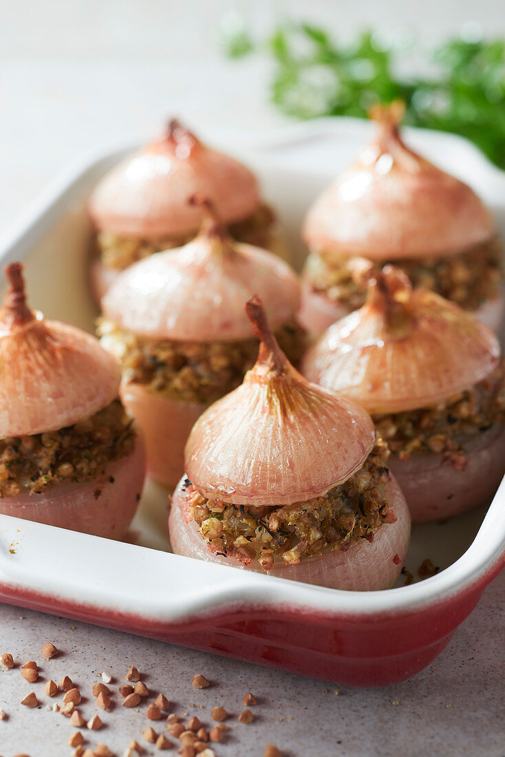 Roscoff onions stuffed with buckwheat and herbs