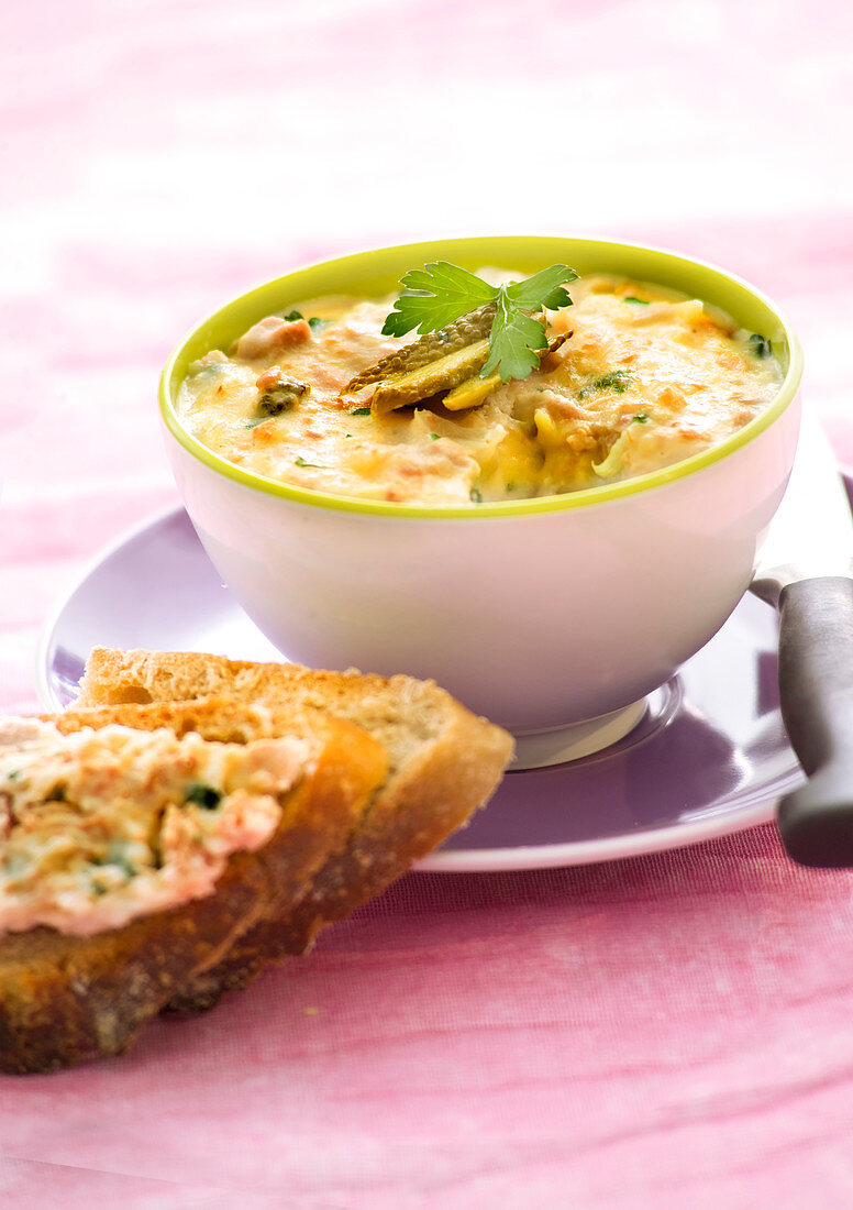 Seafood and gherkin cocktail with bread