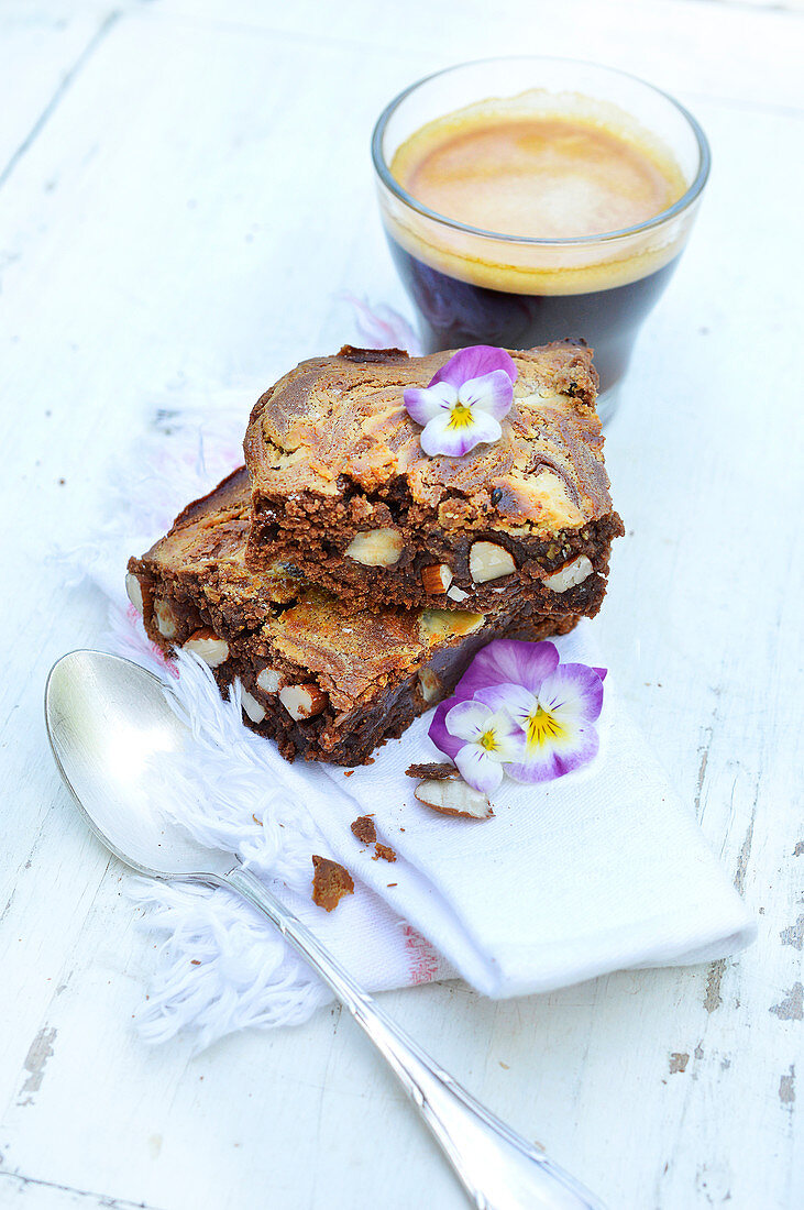 Chocolate and almond marble brownies and an expresso and pansies