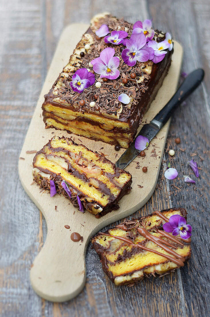 Chocolate and banana cake and pansies