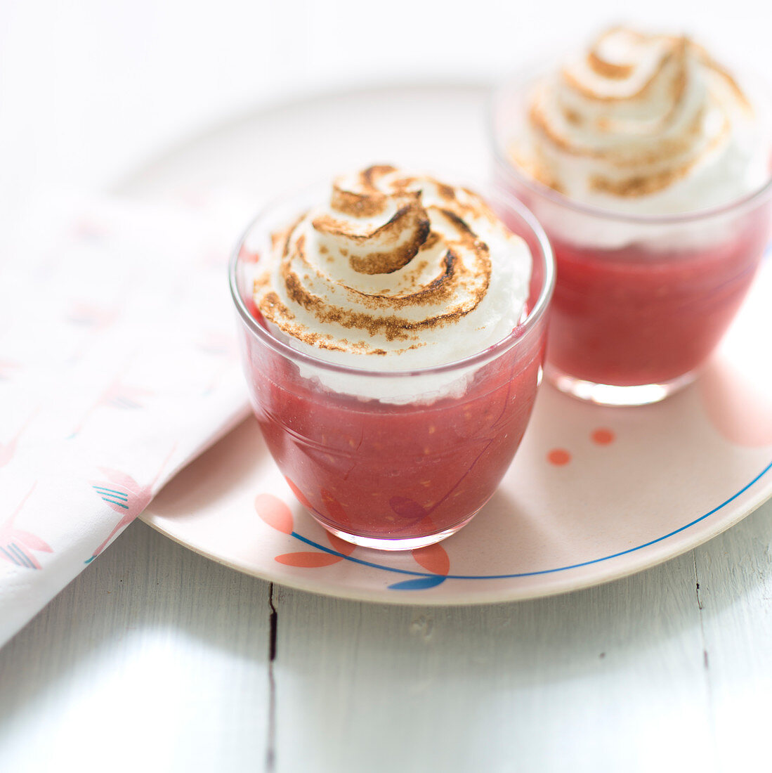 Apple,strawberry and water melon soup topped with meringue