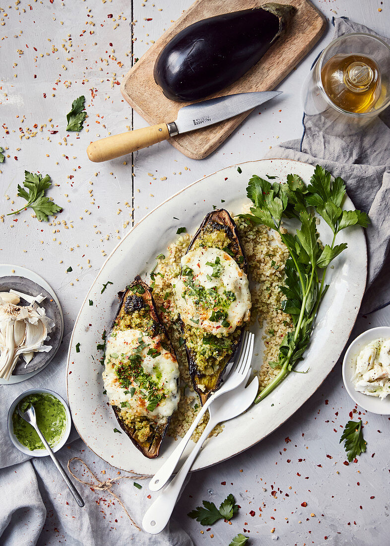 Grilled aubergines stuffed with bulgur and mozzarella,oil and parsley
