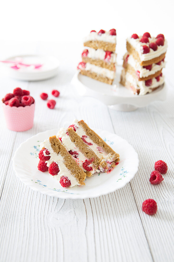 Layer cake with coconut and raspberries