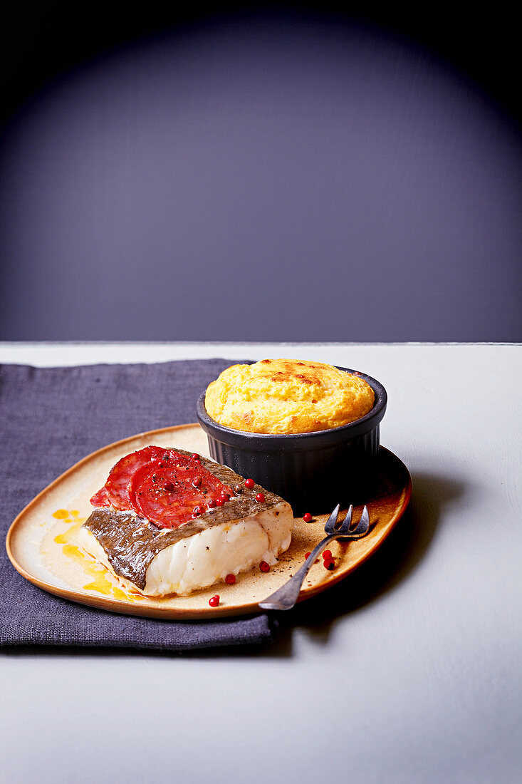 Hake steak with tomatoes and pink pepper,parsnip soufflé