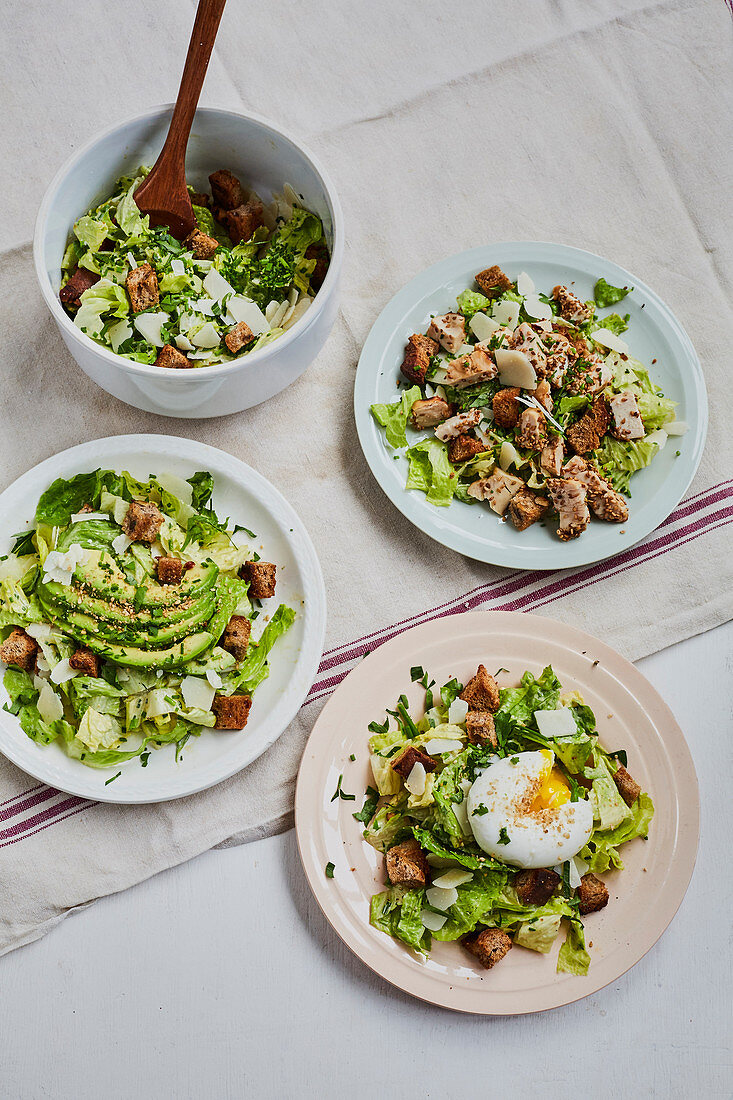 Green leaf salad with croutons, parmesan and various toppings