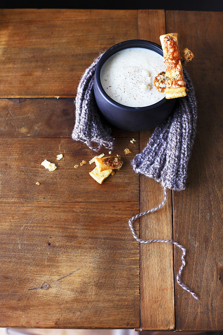Cream of cauliflower soup,grilled tomato flaky pastry fingers