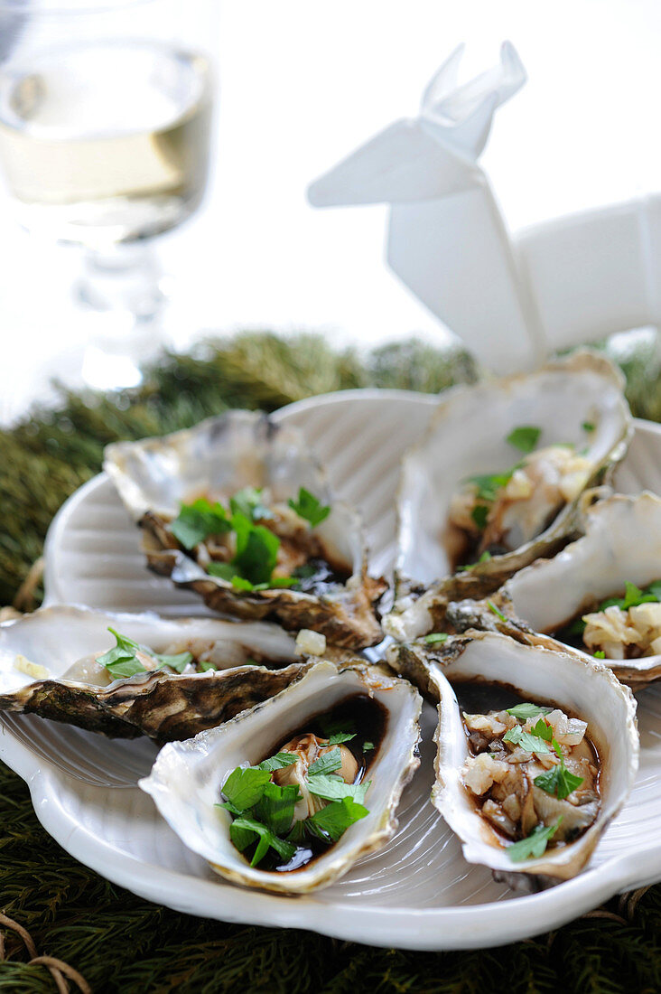 Warm oysters with ginger and coriander