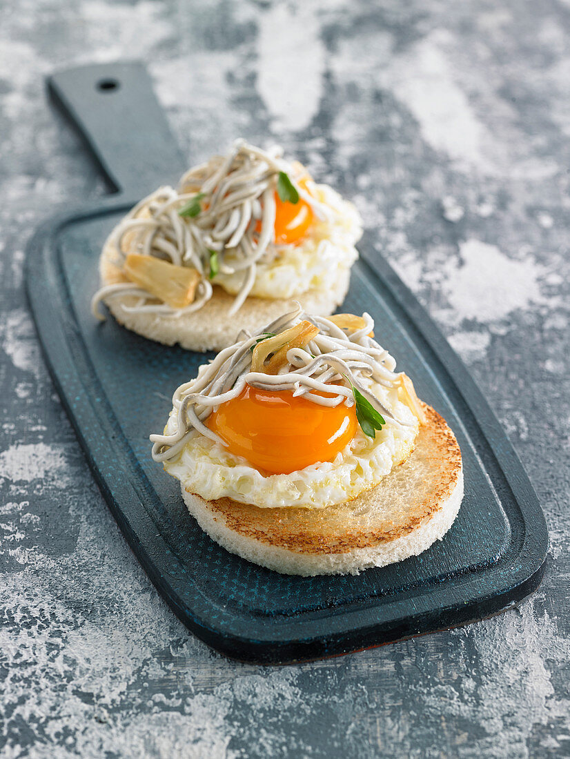 Fried Egg And Garlic Gulas Toasts