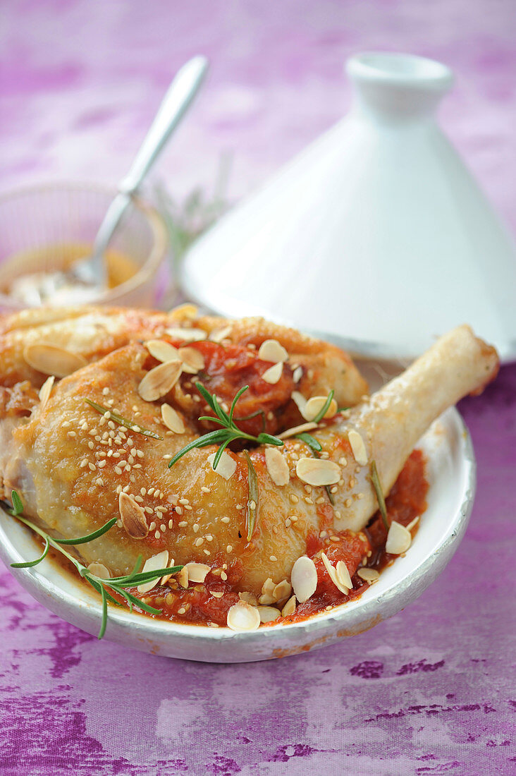 Chicken,tomato,thinly sliced almond and honey tajine