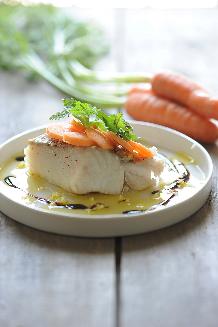 Pollock fillets with carrots and ginger