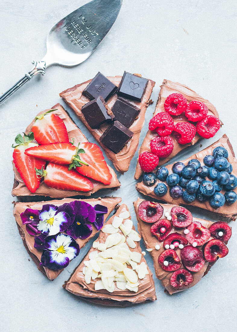 Slices of chocolate,fruit and flower brownies