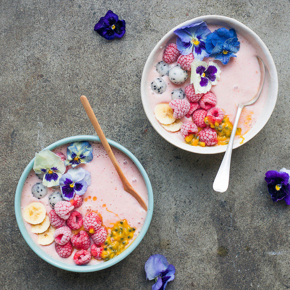 Raspberry and flower pink smoothie bowls