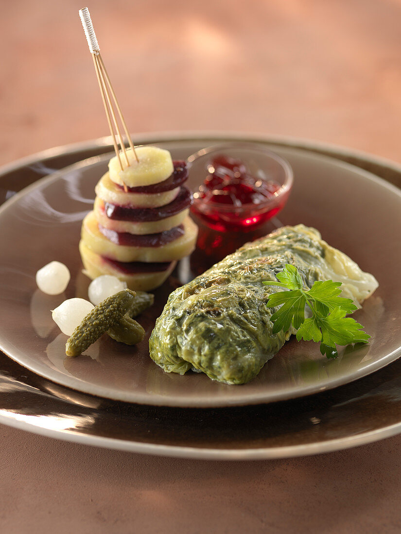 British-style stuffed cabbage,potato and beetroot Samouraï,gherkins,pickled onions and redcurrant jelly